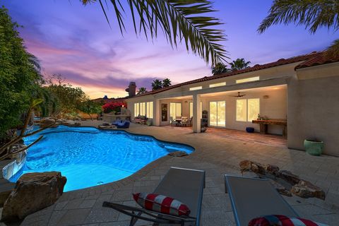 Discover the epitome of desert luxury living in this stunning 4-bedroom, 4-bath residence, beautifully positioned on a generous half-acre lot within the prestigious gated community of Desert River Estates, Indio. This meticulously designed home spans...