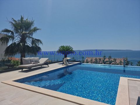 A fantastic new villa for sale, located in a quiet location on the island of Čiovo, only 180 meters away air lines from the sea. The villa is built on a gentle slope, has three floors that are connected by internal stairs, and thanks to the special d...