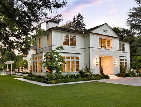 Nestled on one of the most coveted streets in Atherton, this custom-built estate epitomizes refined living with its impeccable design & superior craftsmanship. Upon entry through the contemporary steel & glass doors, guests are greeted by grand livin...