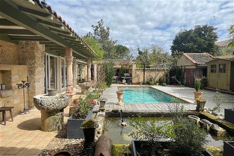 This surprising gated property has been conceived as the perfect relaxing place, each room having access to the private outdoor area, made of terraces, cosy corners, a water piece and a swimming pool. It offers a modern kitchen, a utility room, a 33m...