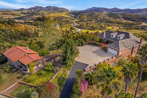 Welcome to your private oasis atop rolling hills, where panoramic views and natural beauty converge creating a haven of unparalleled elegance. This exceptional custom home offers the epitome of refined living, boasting 4,428 s. f. of meticulously cra...