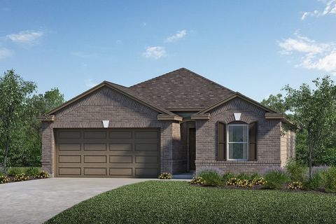 KB HOME NEW CONSTRUCTION - Welcome home to 543 Broken Boulder Street located in Mustang Ridge and zoned to Magnolia ISD! This floor plan features 4 bedrooms, 2 full baths and an attached 2-car garage. Additional features include stainless steel Whirl...