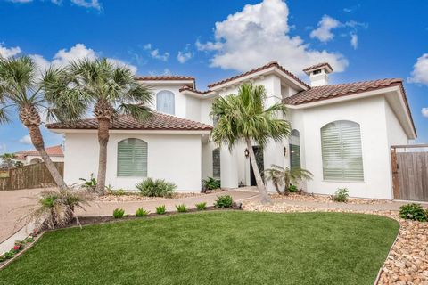 Indulge in coastal luxury living at its finest with this stunning canal-front home nestled in the prestigious gated community of Cane Harbor. Step inside and be captivated by the exquisite craftsmanship showcased throughout. The heart of the home lie...