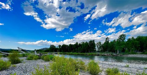 Yellowstone Riverfront Property: 20+/- acres. The majority of the property is elevated from the river, providing ample level build sites for your dream home and guest house. Lot may be used for residential or recreational purposes, per covenants. Thi...