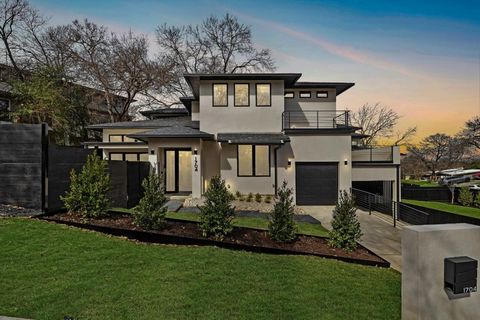 Discover the elegance of 1704 Taylor Gaines Street located in East Travis Heights. This exquisite home stands as a beacon of contemporary opulence, boasting a wealth of sophisticated features. Every element has been carefully designed to showcase exc...