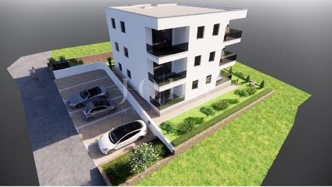 Location: Primorsko-goranska županija, Novi Vinodolski, Povile. Povile - 2-bedroom apartment in a modern new building. For sale is a three-room apartment with an area of ​​53 m2, located on the 1st floor of a residential building with 6 units. The ap...