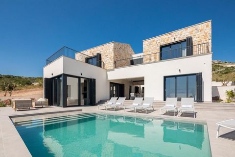 The Exclusive Stone Villa near Rogoznica is a stunning, newly built property that boasts a prime location just 3.6 km from the center of Rogoznica and 6.5 km from the center of Primosten. Situated just 2.3 km from the crystal-clear waters of the sea,...