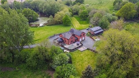 Nestled on the outskirts of the rural hamlet of Letton, this six-bedroom family residence offers a secluded retreat. Set within nearly 6 acres of landscaped gardens, the property boasts serene surroundings. A highlight of the estate is its expansive ...