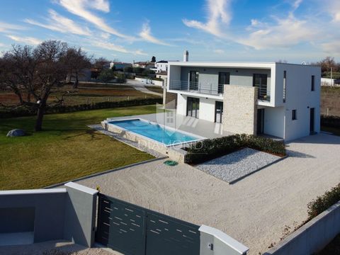 Location: Istarska županija, Poreč, Poreč. Istria, Poreč, surroundings, A few minutes' drive from the city of Poreč, surrounded by greenery and nature, located in a quiet street, there is this beautiful modern detached house with a swimming pool and ...