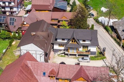 The property is located in Biały Dunajec at Miłośników Podhale Street, 5 km from Zakopane in a quiet area, and yet very well connected to tourists and recreation. Land property developed with two buildings. A residential building, a commercial premis...