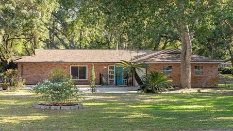 Welcome to Your Sanctuary! Discover this rare gem located in the heart of Lutz, nestled on over an acre in a serene neighborhood. While offering the tranquility of a secluded retreat, this charming 3-bedroom, 2-bath ranch-style pool home is just minu...