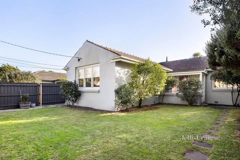 Set behind a tall private fence and greeted by a deep front garden, this delightful two bedroom rendered home is full of stylish quality and northern sun. Warm with polished Tasmanian Oak floorboards, this welcoming gem enjoys a wide entry foyer, a f...