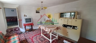 Price: €29.000,00 District: Dobrich Category: House Area: 115 sq.m. Plot Size: 1300 sq.m. Bedrooms: 3 Bathrooms: 1 Location: Countryside One-storey house, 7 Km from beach, Dobrich region. For sale is a well preserved house only7 Km away from the sand...