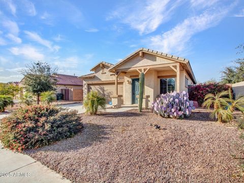 Welcome to this exquisite single-level residence nestled in the heart of Goodyear. This spacious home offers a harmonious blend of comfort and style. Situated on a coveted corner lot, it boasts a sparkling pool and a view fence that provides unobstru...