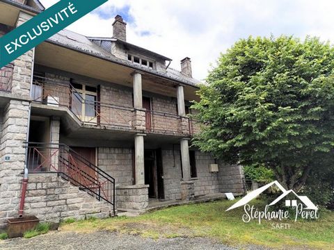 Grande maison mitoyenne à restaurer