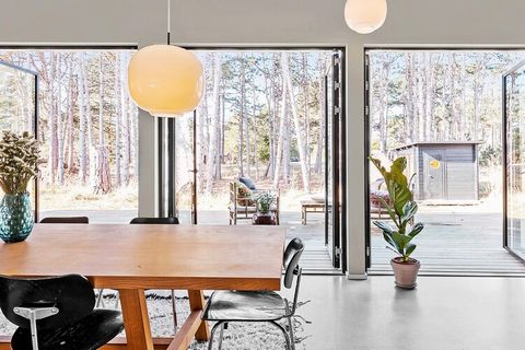Architect-designed open cottage with wilderness bath and sauna located on beautiful natural grounds a few hundred meters from the beach at Sjællands Odde. The cottage is characterized by quality and modern decor, as if there are no curtains. There is...