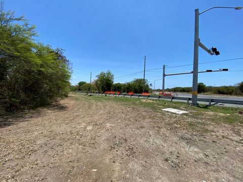 Prime flat commercial lot in a high traffic area! This 3.93 acres lot is conveniently located on the southeast corner of busy Melvin H. Evans Highway and West Airport Road! This is very close to the Henry E. Rohlsen Airport and the residential estate...