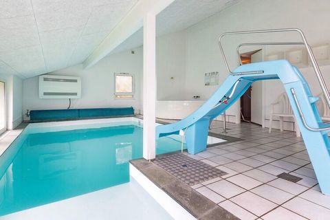 Spacious pool cottage located on beautiful natural grounds close to the cozy town of Tversted, where there are good shopping opportunities. In the indoor swimming pool with whirlpool there is the opportunity for play and cozy togetherness. In connect...