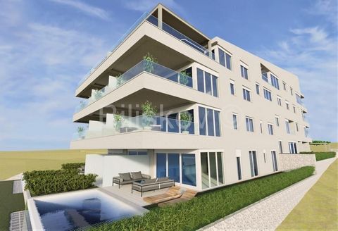 Island of Pag, new building, luxurious two-room apartment of 94.4 m2, on the second and third floor of a new residential building. This two-room comfortable apartment consists of: one bedroom, living room with kitchen and dining room, bathroom, study...
