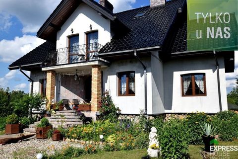 * Beautiful, well-kept house * 8rooms * Residential barn * plot on Serwami *   A two-storey detached house from 2009, in a rustic style, located in the village of Mołowiste on Lake Serwy, 20 km from Augustów.  At the back of the house there is a well...