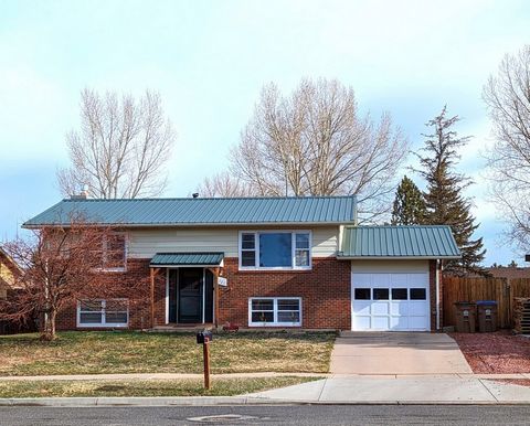 Welcome to this lovely south facing home situated on a large lot and conveniently located to the University of Wyoming. This split level home offers 3 bedrooms, 2 baths, large living room, additional family room, updated appliances and more. Enjoy th...