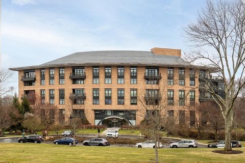 Property is in Boston. Spectacular North-Easterly views of Chestnut Hill Reservoir, Cassidy Park and the City from this 1,990sf penthouse loft-like Watermark unit. Open-plan, 9'_6
