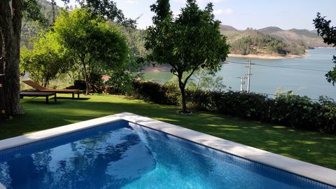 The “River House”, located on the lake of the Castelo do Bode dam on the Zêzere river, is ideal for a relaxing holiday with your family or friends. Enjoy stunning lake views from the comfort of the house, garden and pool. Take advantage of the privat...