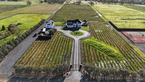 Welcome to your own slice of paradise nestled in the heart of wine country! This gated estate sprawls across 10 acres of pristine land, with 5.2 acres dedicated to Chardonnay and 1.8 acres of Syrah vineyards, ensuring a backdrop of breathtaking beaut...