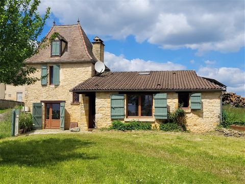 Located in a small hamlet less than 5 minutes from a village with essential shops, this house offers on the ground floor an entrance leading to a living/dining room with kitchen area, a bedroom with direct access to the outside , a bathroom and separ...