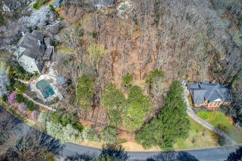 Incredible opportunity to build your custom dream home on this near Acre Lot in the prestigious Rivergate neighborhood. Prime location of Sandy Springs/Dunwoody! Sloped and private. This lot is beautifully situated with frontage and privacy for your ...