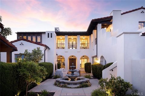 Welcome to 7 Fox Hole Road in Ladera Ranch's exclusive guard-gated enclave of Covenant Hills. This magnificent full-custom estate, designed by award-winning architect R. Douglas Mansfield, is among the finest within the community, boasting a prime se...