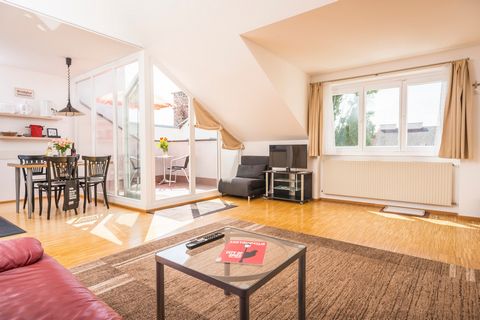 Our 50m² apartment in the attic impresses you with its light-flooded living room. The separate bedroom lets you choose to have either a double bed or two single beds. To allow you to have the same sleeping comfort which you are used to. Your private ...