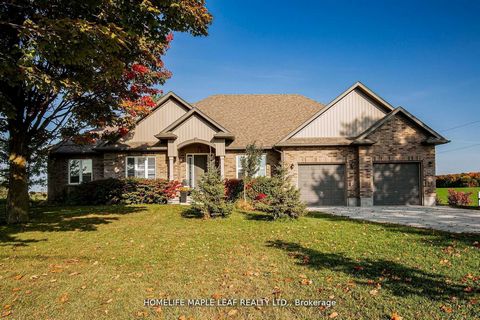 Gorgeous Property. Enjoy Country living Custom Built /Detached Bungalow situated on 1.2 Acre land, Open Concept, living and dining boasts pot lights, 12' ceiling, W/O to 16' X 20' deck, oversized windows and flows into kitchen with centre island, Gra...