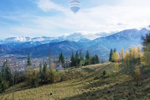 I am pleased to present for sale a property with a majestic view of the Tatra Mountains and Zakopane. The location and slope of the plot guarantees an amazing and unthreatened view of the Tatra Mountains, as well as the panorama of Zakopane. A plot o...