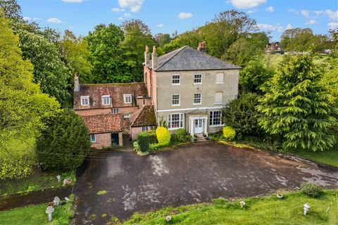 Step inside this impressive residence which has gained Grade II Listed status to acknowledge its architectural excellence and abundant history. As you enter the main residence, The Old Rectory spans three principal floors with functional cellar, boas...