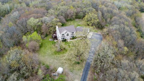 Experience tranquility atop a 15-acre wooded hill near Madison in this exquisite sanctuary, boasting stunning views and absolute privacy. This single-owner, custom-built home features a brick facade, robust 2x6 construction, and spans three finished ...