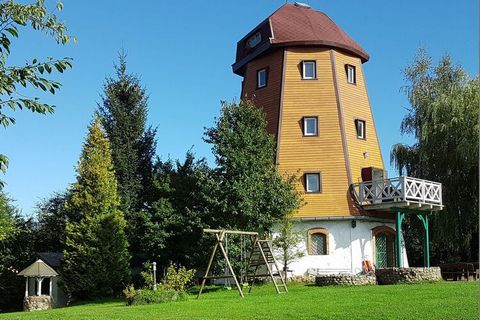 Holiday home in former mill, 230m to Lake Dejgunek, near Giżycko. A picturesque view of the lake and Masurian nature. The house has fireplace heating. You can spend the evenings by the bonfire and the portable grill. Guests can park on the fenced pro...