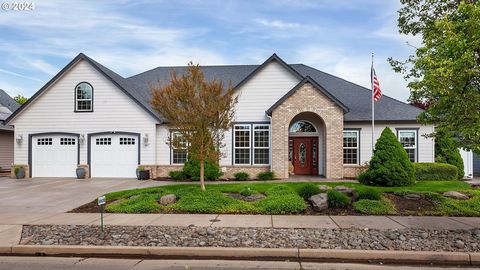 Single level custom Bergby Home in coveted West Park Estates is a fully designed ADA. The home has a grand entry into an open concept living area, with a bonus game room. The home has 2 primary suites with walk in showers, one of them is wheelchair a...