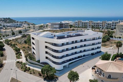 This two bedroom penthouse apartment for sale is set within a newly constructed, luxurious development in Porto de Mós, offering an unparalleled blend of sophistication and coastal living. Just a brief stroll from the beach and a mere five-minute dri...