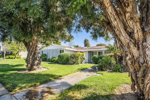 Enjoy the ambience of your Granada-model cottage with inside Atrium, no one above or below, nestled in the interior of Laguna Woods Village, in a quieter neighborhood. This stunning two-bedroom, one-bath Co-op has been upgraded, freshly painted throu...