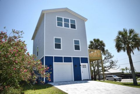Welcome to your dream home on Anastasia Island! This newly built, three-story house offers the perfect blend of modern luxury and coastal charm. Boasting 4 bedrooms and 3.5 bathrooms, this spacious home sits on a large, high and dry lot. Two master s...