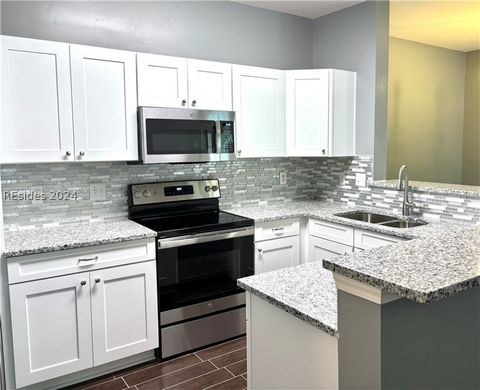 Welcome to the Estates at Westbury Park. This stunning condo is just a stone's throw away from beautiful Hilton Head Island and downtown Bluffton. This condo has been recently renovated. The kitchen is fully equipped with all the latest appliances an...