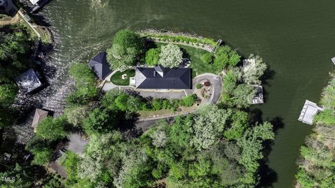 Arguably the best panoramic peninsula view on Lake James, including two separate dockable lots, totaling 3.05 acres. Nestled in Lake View Hills Estates, a gated community just 15 minutes from Marion, this estate was heavily renovated in 2020 and 2021...