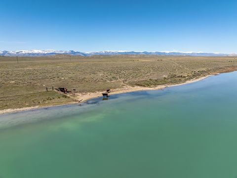 Seize the opportunity to acquire an unparalleled property tailored for both cattle ranching and hunting pursuits, located inside the reservation with no deeded access and priced to sell. This remarkable estate features its own exclusive 60 feet of Wy...