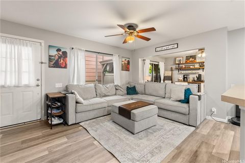 Welcome to the epitome of island-style living. This stunning 3-bedroom, 2.5-bathroom home in the Ewa Gentry Las Brisas community seamlessly blends convenience with practicality. Its spacious and inviting living area effortlessly connects the living r...