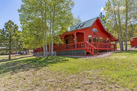 Welcome to this charming 1270 sq ft home in Rosita, Colorado, nestled on a picturesque .65 acres of land. This beautifully maintained property uniquely blends history and modern comfort, making it the perfect retreat for those seeking a peaceful and ...