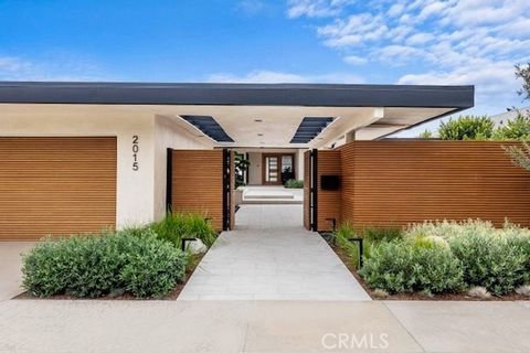 Stunning views are only the tip of the iceberg when it comes to this newly remodeled mid-century modern home that exemplifies indoor/outdoor living. As one of the most ideal properties on one of the best streets in the highly sought-after community o...