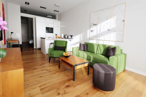The one bedroom apartment feels very spacious with an efficient floor plan. From the living room you enter onto the terrace. The terrace lies in a south west direction, ideal for enjoying the the sun. The apartment includes a bespoke modern kitchen e...