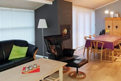 This cottage, which has i.a. sauna and whirlpool, is located in the popular holiday home area Mommark in the first row with a free and completely unique view of the sea with views to i.a. Ærø near Funen. The heart of the cottage is the living room an...