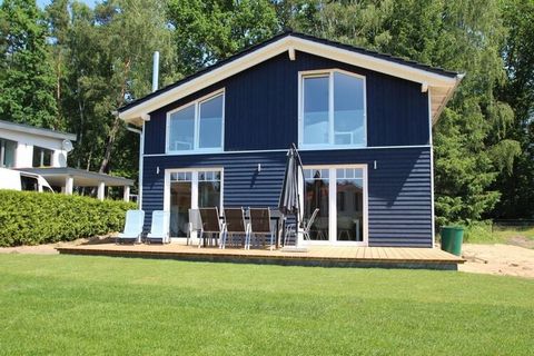 Modern and high-quality holiday home in Scandinavian design with rowing boat, sauna, WiFi and fireplace, in a great location directly on Lake Dümmer. The small holiday home area is idyllically located in a nature reserve in the West Mecklenburg hills...
